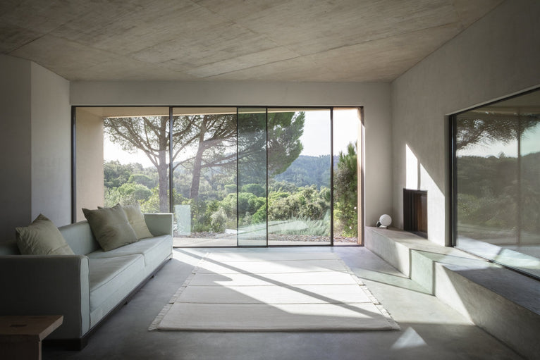 Massimo Atoll Cream hand tufted wool rug, shown in an interior