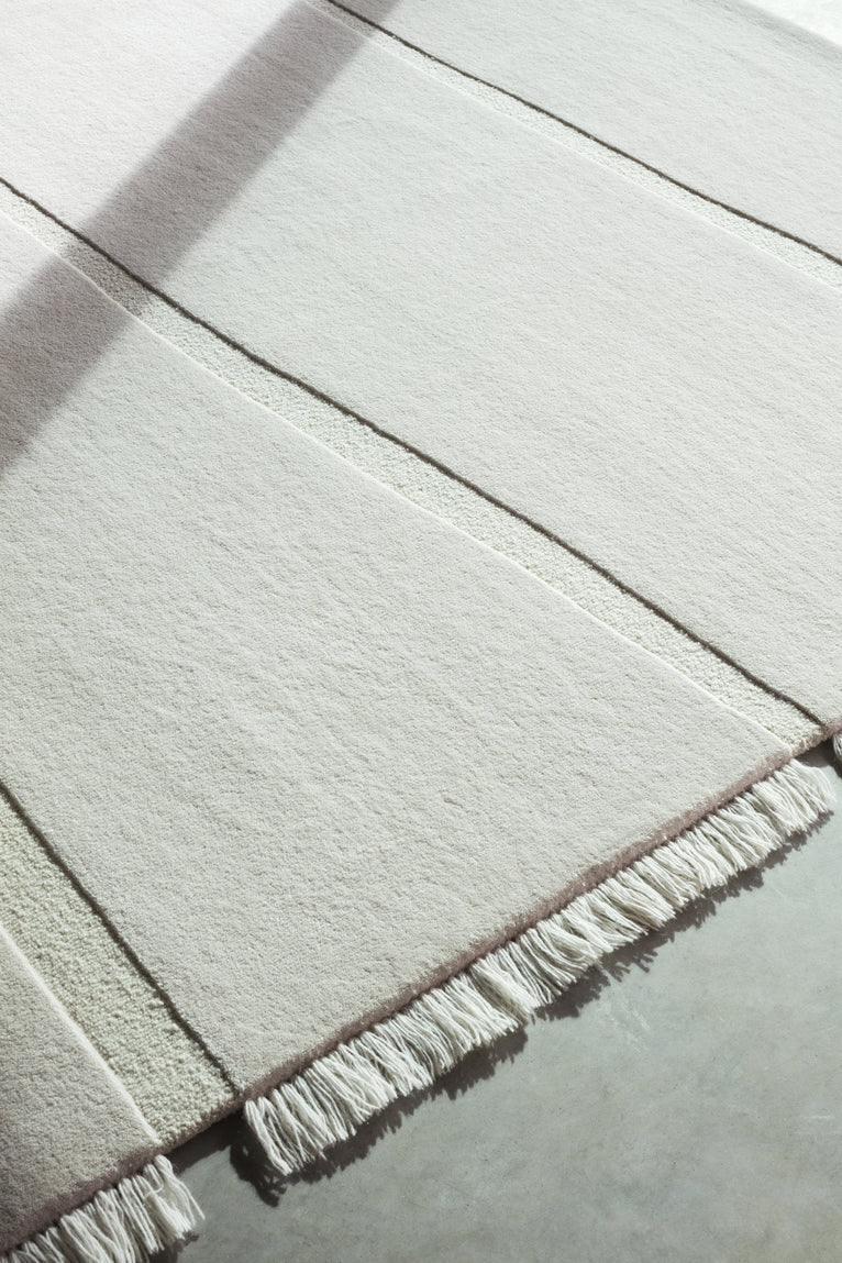 Massimo Atoll Cream hand tufted wool rug, detail of the corner
