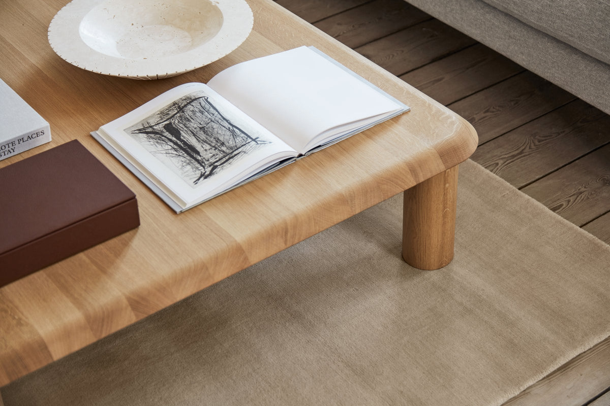 Massimo Earth Bamboo Desert Sand wool rug, shown in an interior