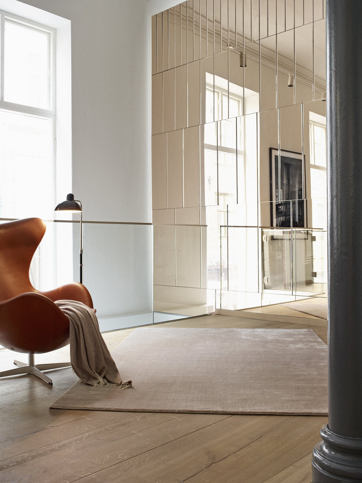 Massimo Earth Bamboo Nougat Rose wool rug, shown in an interior