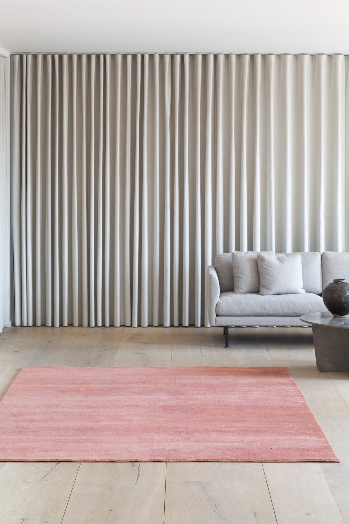 Massimo Earth Bamboo Terra Cotta wool rug, shown in an interior