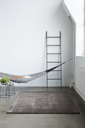 Massimo Earth Bamboo Warm Grey taupe rug, shown in an interior