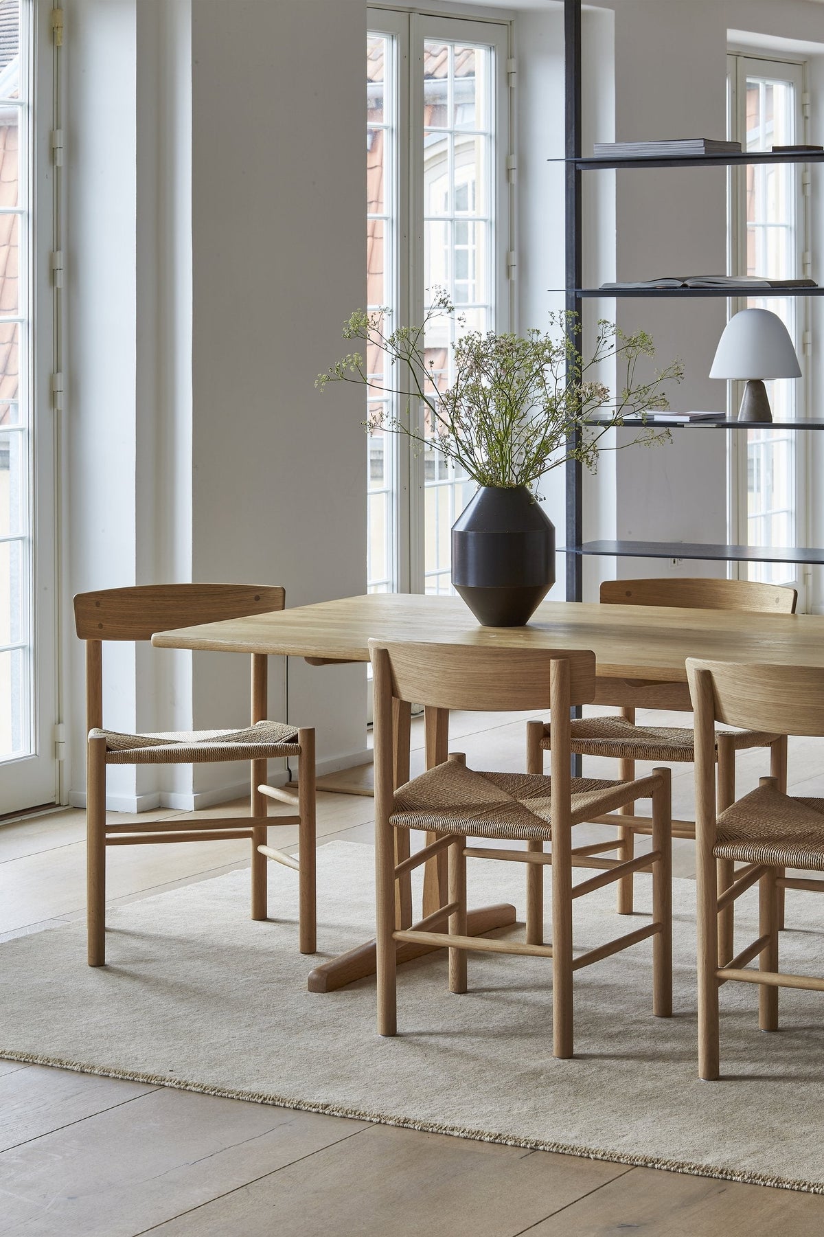 Massimo Earth Natural Light Beige wool rug, shown in an interior