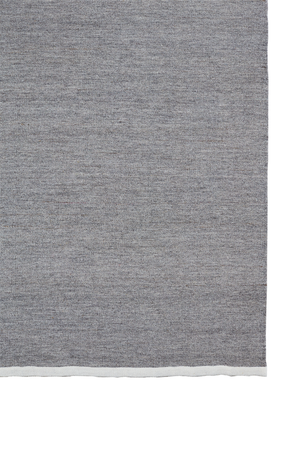 Massimo Escape Kelim Stone grey kilim rug, full view with the contrasting band at the end