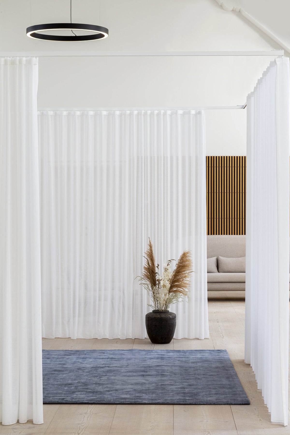 Massimo Karma Washed Blue bamboo silk rug, shown in an interior