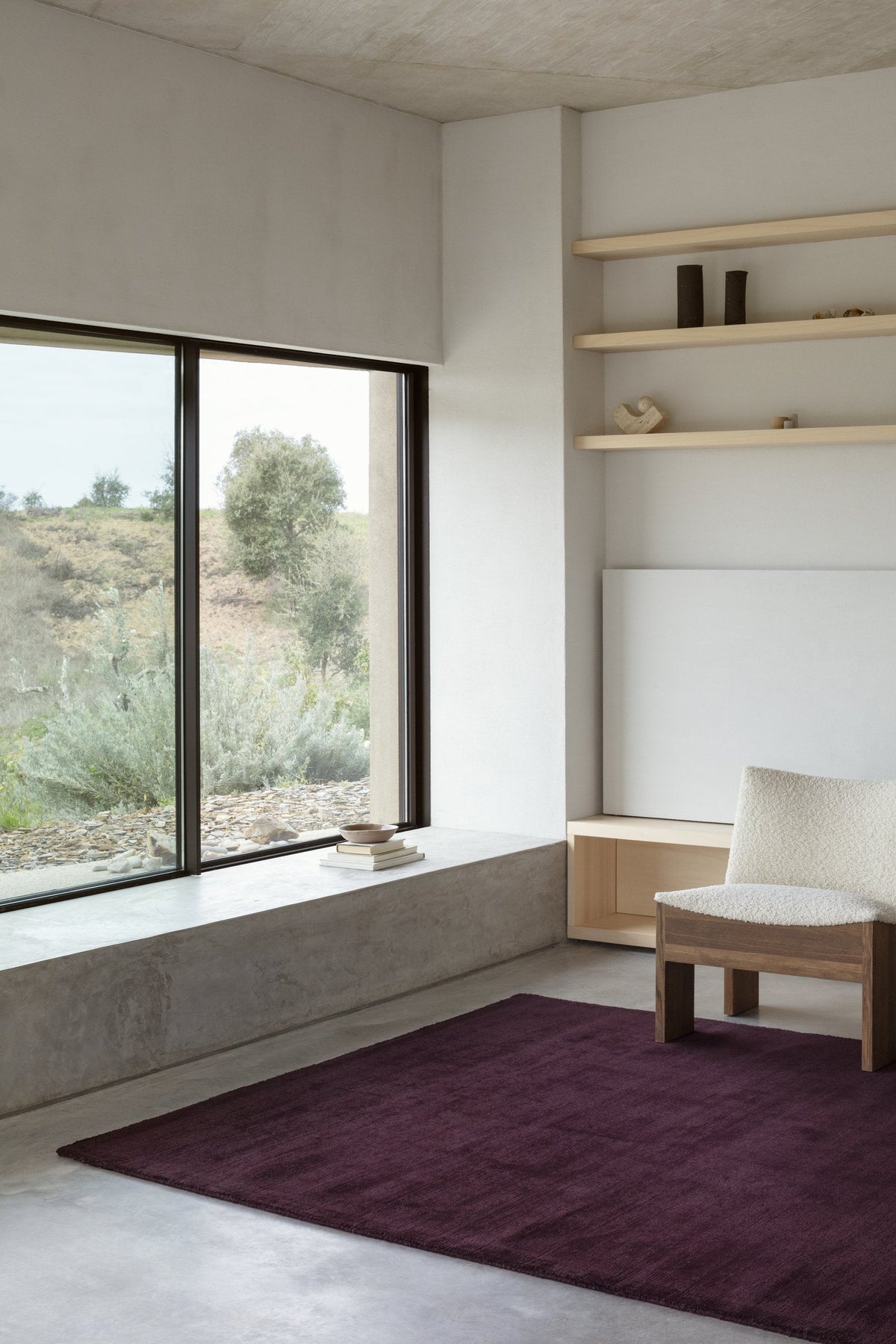 Massimo Karma Wool Burgundy handloomed rug, shown in an interior