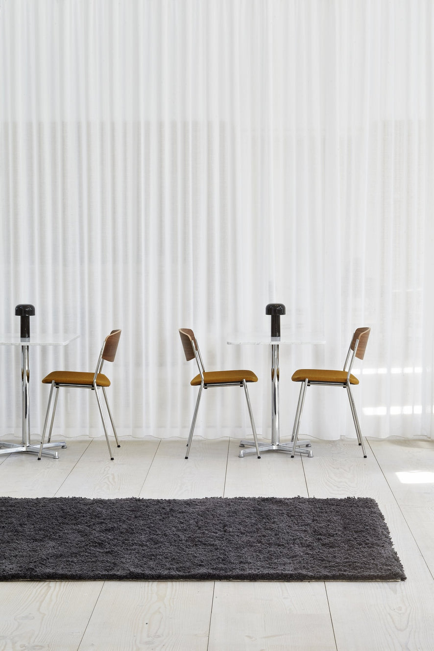 Massimo Rya Charcoal high pile wool rug, shown in an interior