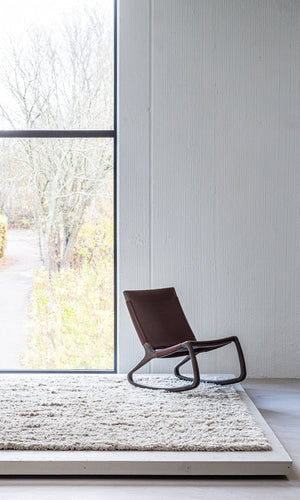 Massimo Rya Soft Beige high pile wool rug, shown in an interior