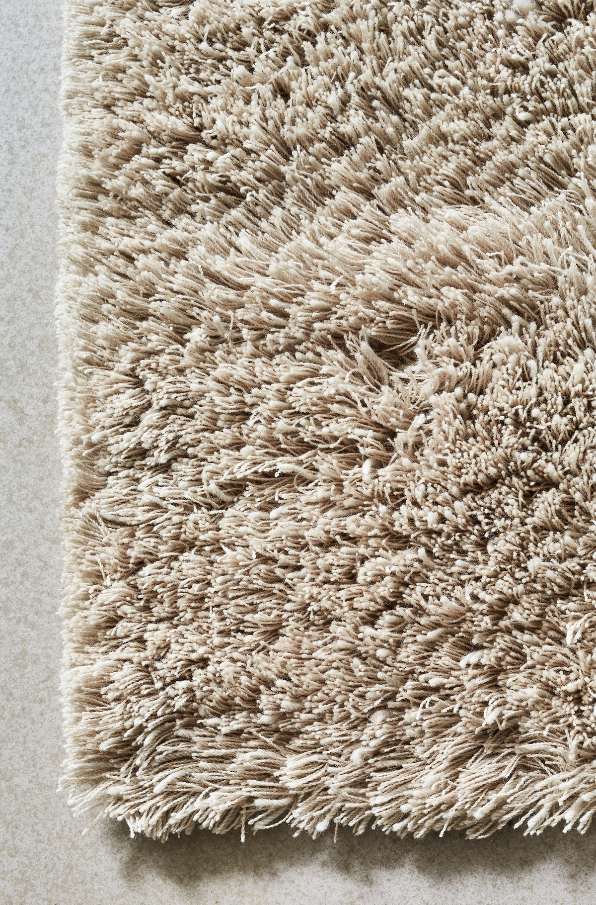 Massimo Rya Soft Beige high pile wool rug, detail of the corner